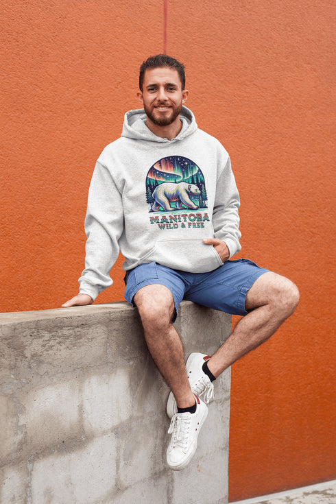 Featuring a majestic polar bear set against the breathtaking backdrop of the northern lights, this hoodie celebrates the spirit of Manitoba’s wild landscapes.