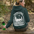 This cozy hoodie features a bold back print of a bear walking beneath a crescent moon and pine trees—capturing everything we love about Canada’s wilderness.