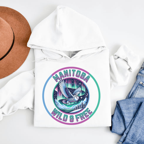 Featuring a stunning graphic of a majestic snowy owl in flight, set against the glowing northern lights, this hoodie embodies the freedom and grace of the province’s untamed wilderness.
