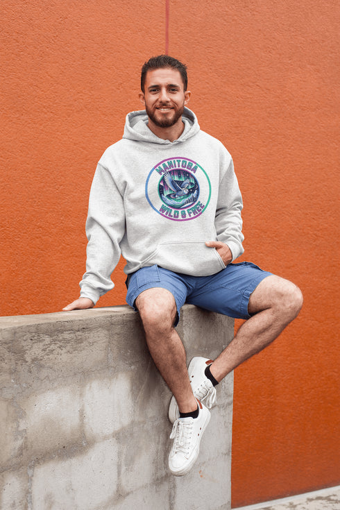 Featuring a stunning graphic of a majestic snowy owl in flight, set against the glowing northern lights, this hoodie embodies the freedom and grace of the province’s untamed wilderness.