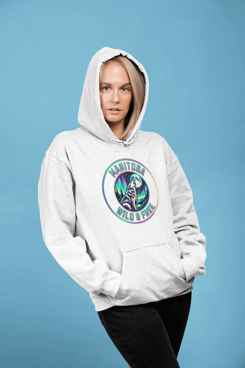 Featuring a powerful graphic of a wolf howling at the moon beneath a sky lit up by the mesmerizing northern lights, this hoodie captures the untamed beauty of Manitoba.
