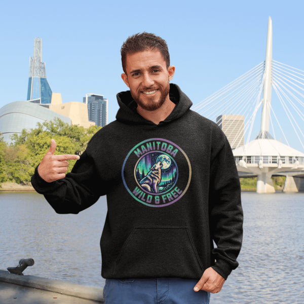 Featuring a powerful graphic of a wolf howling at the moon beneath a sky lit up by the mesmerizing northern lights, this hoodie captures the untamed beauty of Manitoba.