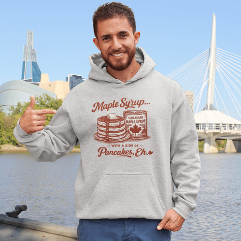 Funny Canadian maple syrup hoodie with pancake stack and Canadian maple syrup tin graphic that says “Maple Syrup With a Side of Pancakes Eh”