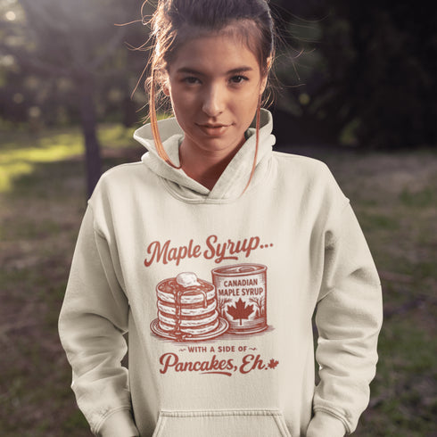 Funny Canadian maple syrup hoodie with pancake stack and Canadian maple syrup tin graphic that says “Maple Syrup With a Side of Pancakes Eh”
