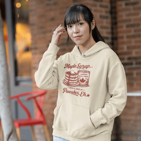 Funny Canadian maple syrup hoodie with pancake stack and Canadian maple syrup tin graphic that says “Maple Syrup With a Side of Pancakes Eh”