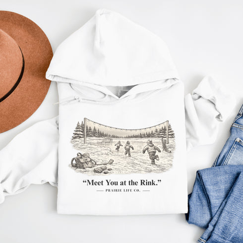 Meet You at the Rink Hoodie – cozy outdoor hockey sweatshirt inspired by backyard rink memories. Unisex fit. Multiple colors available.