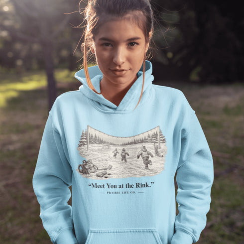 Meet You at the Rink Hoodie – cozy outdoor hockey sweatshirt inspired by backyard rink memories. Unisex fit. Multiple colors available.