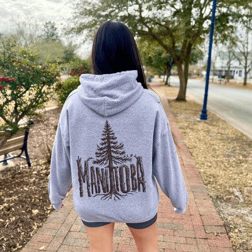 Show your love for Manitoba’s natural beauty with this cozy and stylish hoodie featuring “Manitoba” in a beautifully crafted tree branch font.