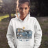 Newfoundland graphic hoodie featuring puffins, whale, fishing village, and coastal East Coast Canada design on a unisex sweatshirt