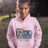 Newfoundland graphic hoodie featuring puffins, whale, fishing village, and coastal East Coast Canada design on a unisex sweatshirt
