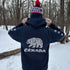 Northern Heritage Bear Hoodie featuring Indigenous-inspired bear artwork and bear paw sleeve graphics. Cozy Canada pullover sweatshirt built for warmth, heritage, and style.