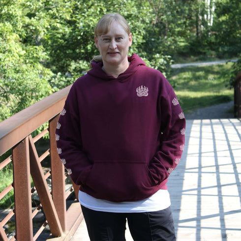 Northern Heritage Bear Hoodie featuring Indigenous-inspired bear artwork and bear paw sleeve graphics. Cozy Canada pullover sweatshirt built for warmth, heritage, and style.
