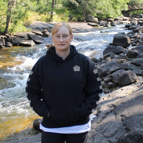 Northern Heritage Bear Hoodie featuring Indigenous-inspired bear artwork and bear paw sleeve graphics. Cozy Canada pullover sweatshirt built for warmth, heritage, and style.