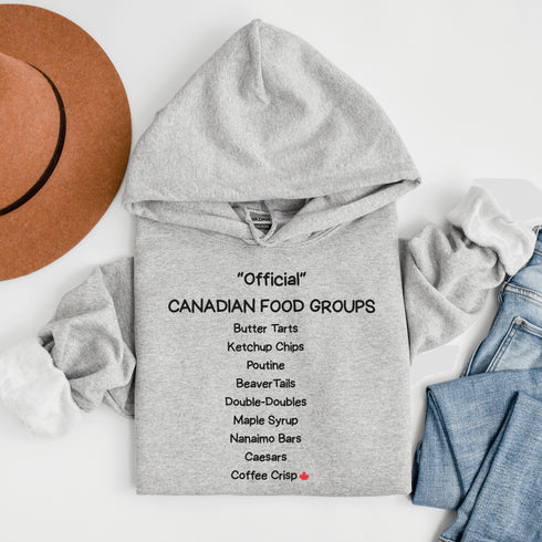 Celebrate Canada's most iconic foods with the Official Canadian Food Groups Hoodie featuring butter tarts, poutine, ketchup chips, maple syrup and more. A cozy funny Canadian hoodie perfect for proud Canadians, food lovers, and unique Canada gifts.