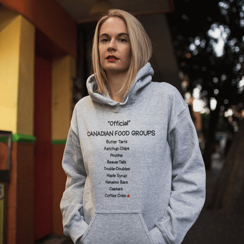 Celebrate Canada's most iconic foods with the Official Canadian Food Groups Hoodie featuring butter tarts, poutine, ketchup chips, maple syrup and more. A cozy funny Canadian hoodie perfect for proud Canadians, food lovers, and unique Canada gifts.