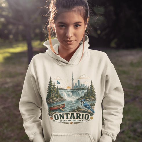Person wearing a hoodie with Ontario-themed design outdoors