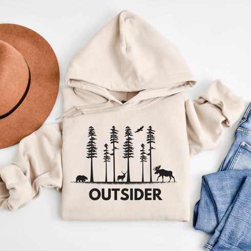 The Outsider Hoodie features a charming forest scene with a moose, a bear, and a deer—aka the unspoken rulers of the woods.