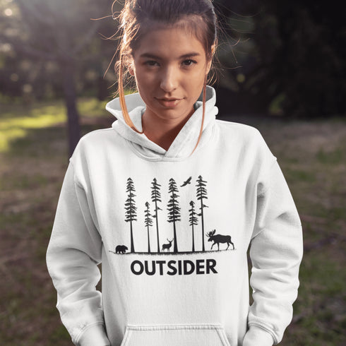 The Outsider Hoodie features a charming forest scene with a moose, a bear, and a deer—aka the unspoken rulers of the woods.