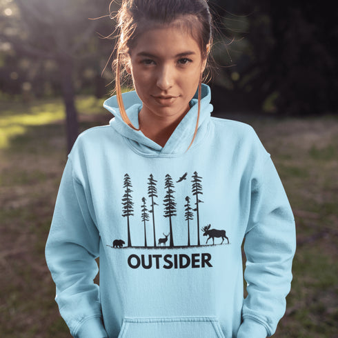 The Outsider Hoodie features a charming forest scene with a moose, a bear, and a deer—aka the unspoken rulers of the woods.