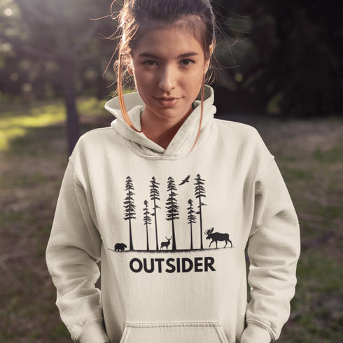 The Outsider Hoodie features a charming forest scene with a moose, a bear, and a deer—aka the unspoken rulers of the woods.