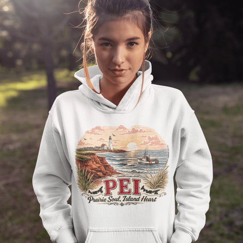 Person wearing a white hoodie with a scenic design and 'PEI' text outdoors.