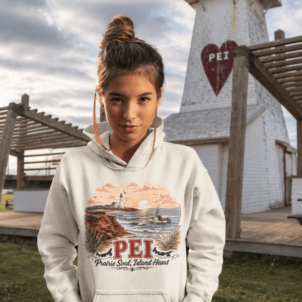 Person wearing a hoodie with PEI design in front of a lighthouse.