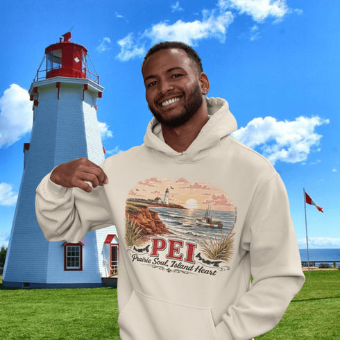 Man wearing a hoodie with PEI design in front of a lighthouse