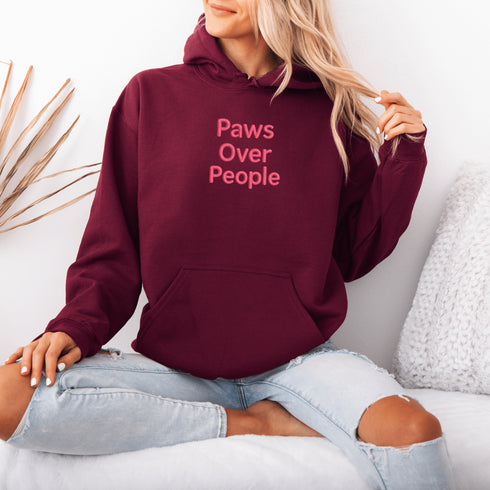 This embroidered hoodie says what every true animal lover is already thinking: Paws. Always. Over. People.