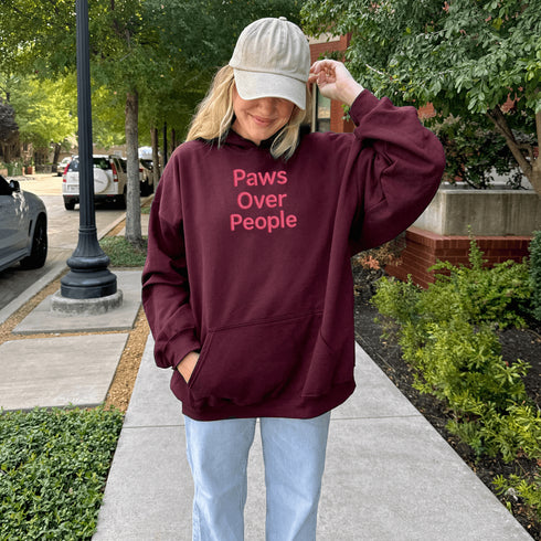 This embroidered hoodie says what every true animal lover is already thinking: Paws. Always. Over. People.