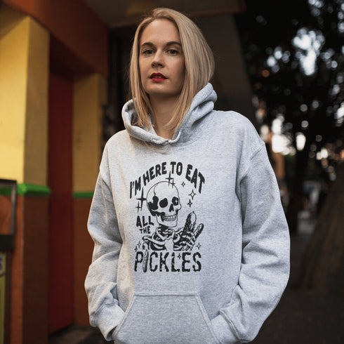 Whether you're out haunting or hoarding pickles, this hoodie’s got you covered—literally. Soft, cozy, and designed for the pickle-loving rebel inside you.