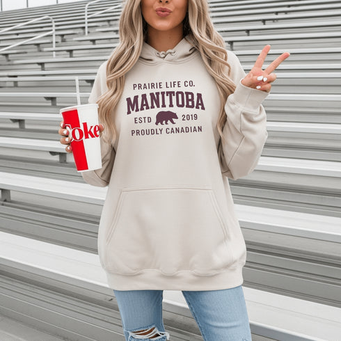 Celebrate your roots in comfort and style with our Heritage Hoodie, a timeless classic designed for proud Manitobans and Canadians alike.