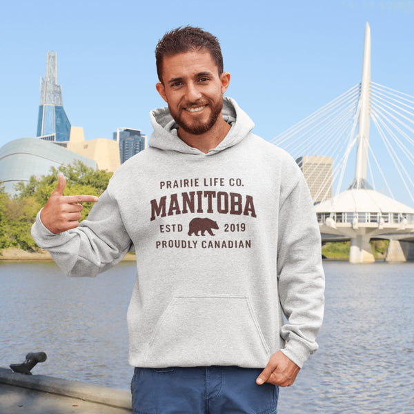 Celebrate your roots in comfort and style with our Heritage Hoodie, a timeless classic designed for proud Manitobans and Canadians alike.