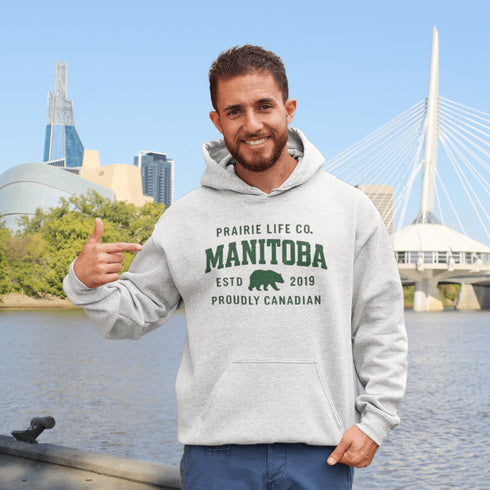 Celebrate your roots in comfort and style with our Heritage Hoodie, a timeless classic designed for proud Manitobans and Canadians alike.