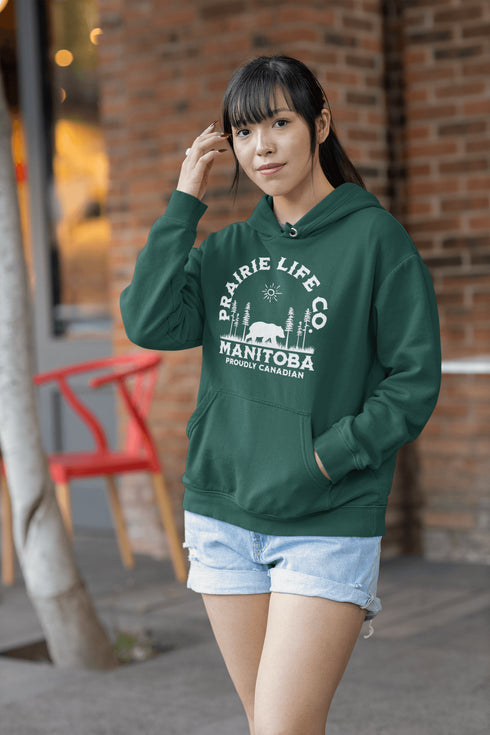 Featuring a bold graphic of a majestic bear surrounded by trees, this hoodie is perfect for those who love exploring nature or simply want to carry a bit of wilderness with them wherever they go.