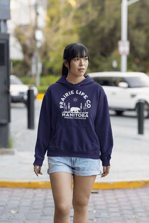 Featuring a bold graphic of a majestic bear surrounded by trees, this hoodie is perfect for those who love exploring nature or simply want to carry a bit of wilderness with them wherever they go.