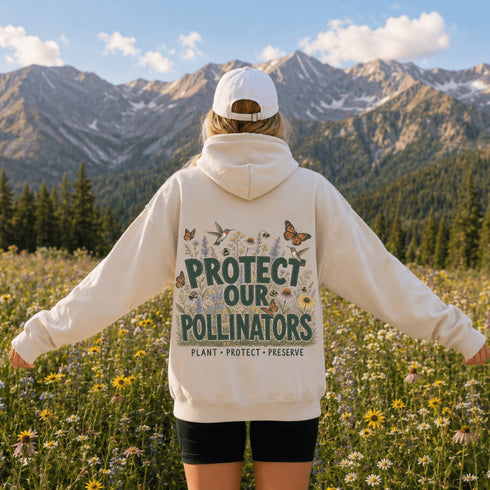 Unisex Gildan 18500 hoodie featuring a matching left chest graphic and a large vintage-inspired back design celebrating pollinators, wildflowers, bees, butterflies, and hummingbirds. Available in multiple colors for hiking, gardening, camping, nature lovers, and everyday outdoor wear.