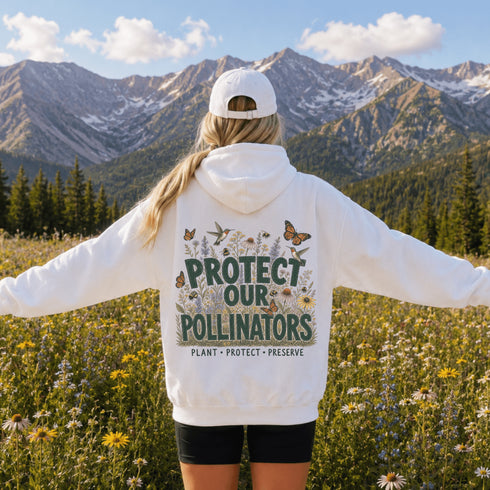 Unisex Gildan 18500 hoodie featuring a matching left chest graphic and a large vintage-inspired back design celebrating pollinators, wildflowers, bees, butterflies, and hummingbirds. Available in multiple colors for hiking, gardening, camping, nature lovers, and everyday outdoor wear.