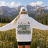 Unisex Gildan 18500 hoodie featuring a matching left chest graphic and a large vintage-inspired back design celebrating pollinators, wildflowers, bees, butterflies, and hummingbirds. Available in multiple colors for hiking, gardening, camping, nature lovers, and everyday outdoor wear.