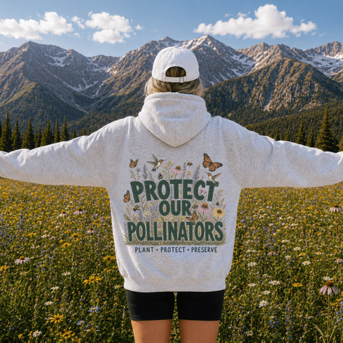 Unisex Gildan 18500 hoodie featuring a matching left chest graphic and a large vintage-inspired back design celebrating pollinators, wildflowers, bees, butterflies, and hummingbirds. Available in multiple colors for hiking, gardening, camping, nature lovers, and everyday outdoor wear.