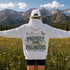 Unisex Gildan 18500 hoodie featuring a matching left chest graphic and a large vintage-inspired back design celebrating pollinators, wildflowers, bees, butterflies, and hummingbirds. Available in multiple colors for hiking, gardening, camping, nature lovers, and everyday outdoor wear.