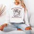 This hoodie combines the wisdom of the Wild West with the zen of overstimulation recovery. Featuring a raccoon—rocking a cowboy hat, and meditating.