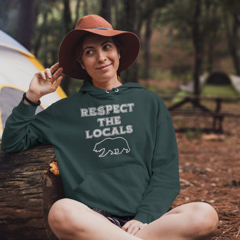 Introducing our rugged and stylish camping hoodie featuring a majestic bear design and the iconic phrase "Respect The Locals."