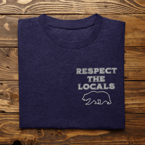 Introducing our latest camping t-shirt featuring a bear graphic and the empowering slogan "Respect The Locals". Crafted for outdoor enthusiasts and nature lovers, this shirt is a must-have for your next adventure in the wilderness.