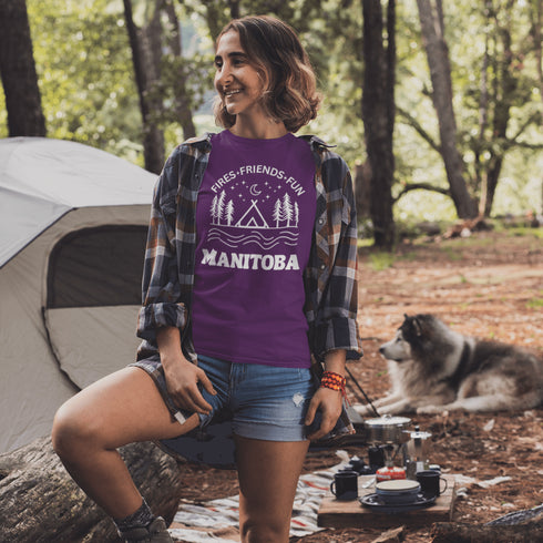 Introducing our exclusive camping t-shirt featuring a camping scene and the catchy slogan "Manitoba - Fires, Friends, Fun."