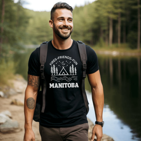 Introducing our exclusive camping t-shirt featuring a camping scene and the catchy slogan "Manitoba - Fires, Friends, Fun."