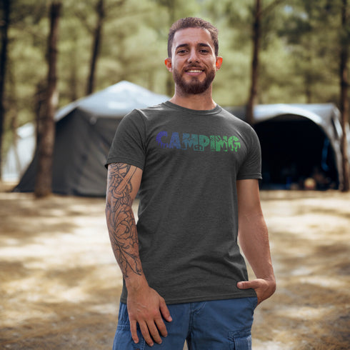 This unique tee features a captivating camping scene intricately etched inside the word "Camping," creating a stunning visual that captures the essence of outdoor adventure.
