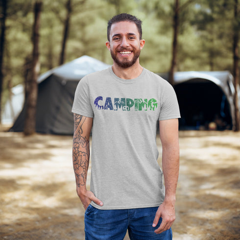 This unique tee features a captivating camping scene intricately etched inside the word "Camping," creating a stunning visual that captures the essence of outdoor adventure.
