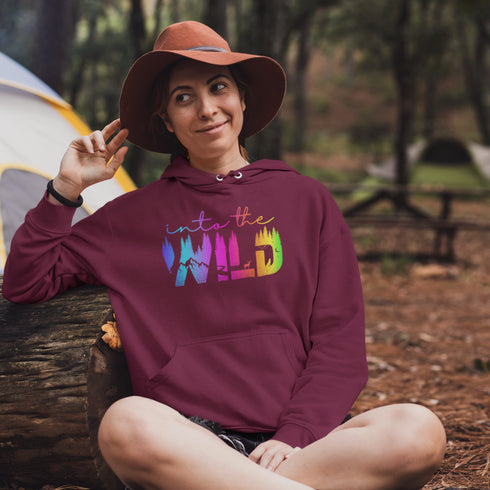 Step into the wild with our unique camping hoodie, featuring a captivating camping scene intricately etched inside the words "Into The Wild".