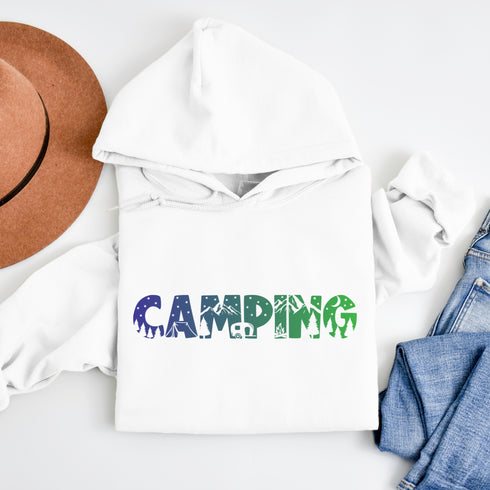Crafted with comfort and style in mind, this hoodie features a unique camping scene etched into the word "CAMPING" on the front, adding a touch of nature to your wardrobe.