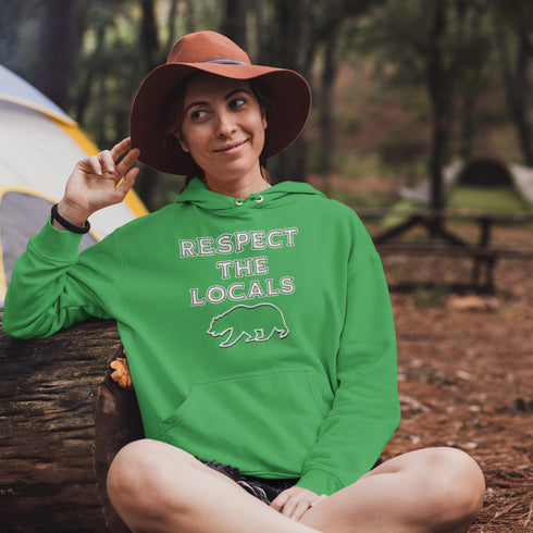 Introducing our rugged and stylish camping hoodie featuring a majestic bear design and the iconic phrase "Respect The Locals."